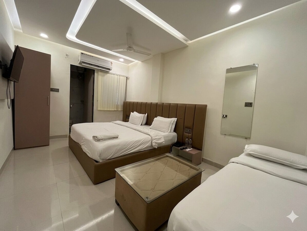 Imagen de la habitación del Hotel Venzaa Inn. Foto 10