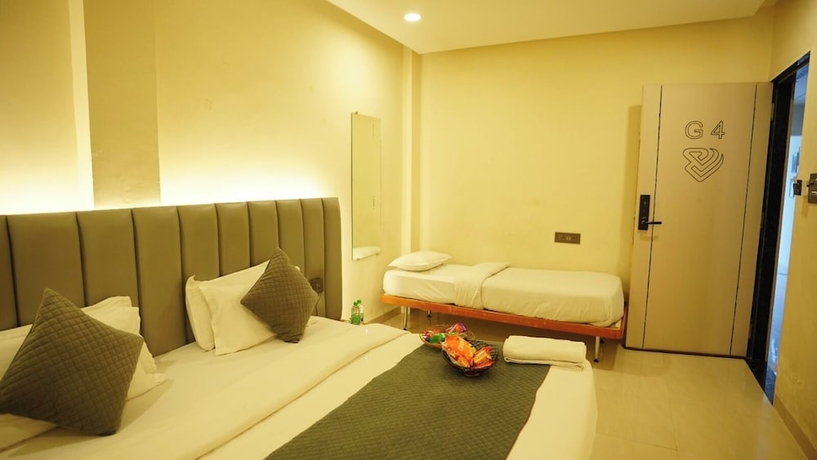 Imagen de la habitación del Hotel Venzaa Inn. Foto 11
