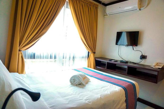 Imagen de la habitación del Hotel Veranda Suites and Restaurant. Foto 4