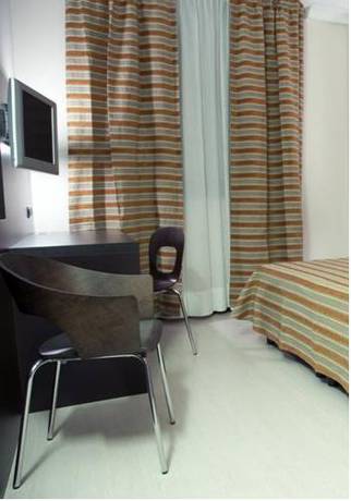 Imagen de la habitación del Hotel Vercelli Palace. Foto 8