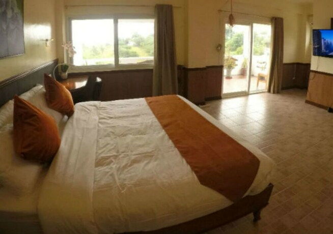 Imagen de la habitación del Hotel Verde View Villas. Foto 31