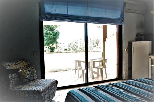 Imagen de la habitación del Hotel Verdemare Sardegna Uno. Foto 5