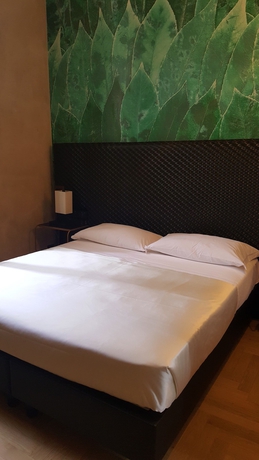 Imagen de la habitación del Hotel Verdi Boutique. Foto 8