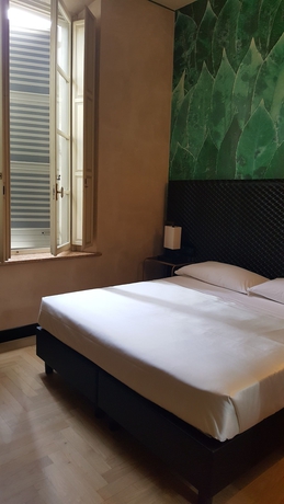 Imagen de la habitación del Hotel Verdi Boutique. Foto 10