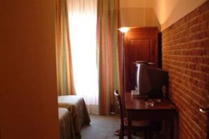 Imagen de la habitación del Hotel Verdi Pisa. Foto 8