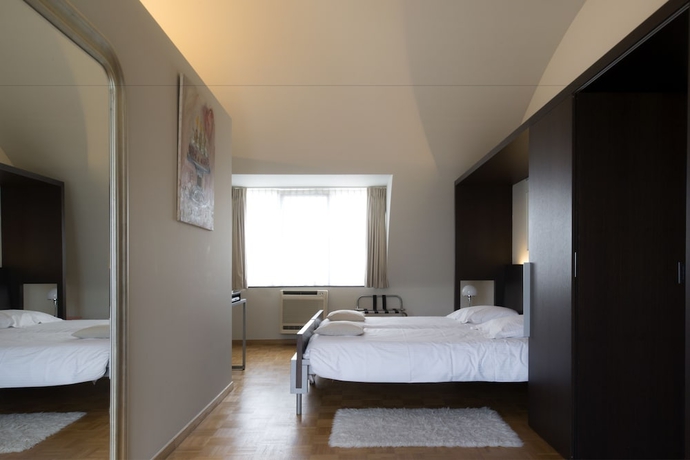 Imagen de la habitación del Hotel Verlooy. Foto 12