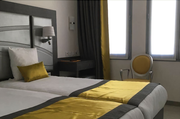 Imagen de la habitación del Hotel Versailles Chantiers. Foto 13