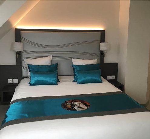 Imagen de la habitación del Hotel Versailles Chantiers. Foto 15