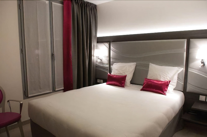 Imagen de la habitación del Hotel Versailles Chantiers. Foto 16