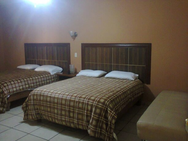 Imagen de la habitación del Hotel Versalles Inn. Foto 5