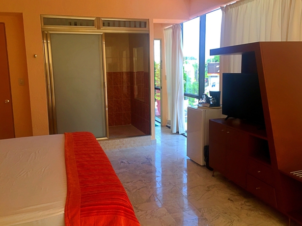 Imagen de la habitación del Hotel Versalles Suites, Canc&uacute;n Centro. Foto 14