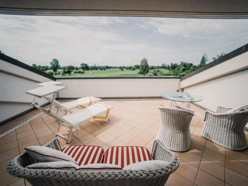 Imagen de la habitación del Hotel Versilia Golf Resort. Foto 9