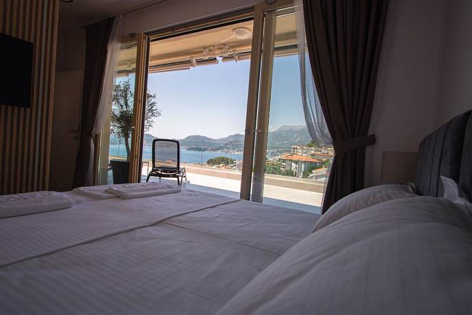 Imagen de la habitación del Hotel Vertmont Villa. Foto 7