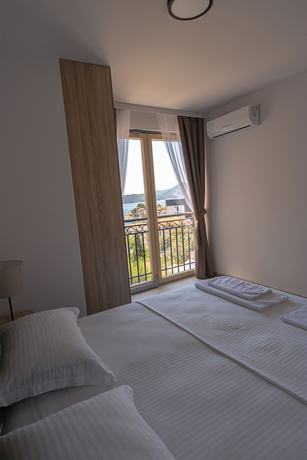 Imagen de la habitación del Hotel Vertmont Villa. Foto 12