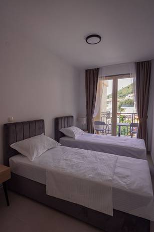Imagen de la habitación del Hotel Vertmont Villa. Foto 13