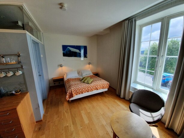 Imagen de la habitación del Hotel Vertshuset R&oslash;ros. Foto 11