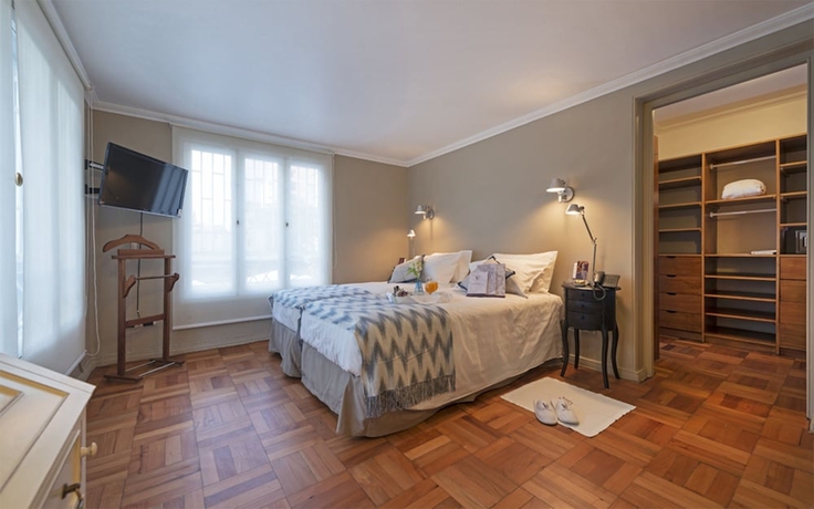 Imagen de la habitación del Hotel Vespucci Suites. Foto 12