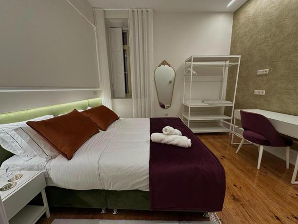 Imagen de la habitación del Hotel Vestigios de Charme - Figueira Suits. Foto 2