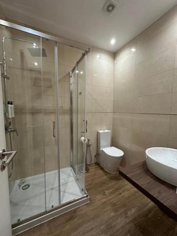 Imagen de la habitación del Hotel Vestigios de Charme - Figueira Suits. Foto 3