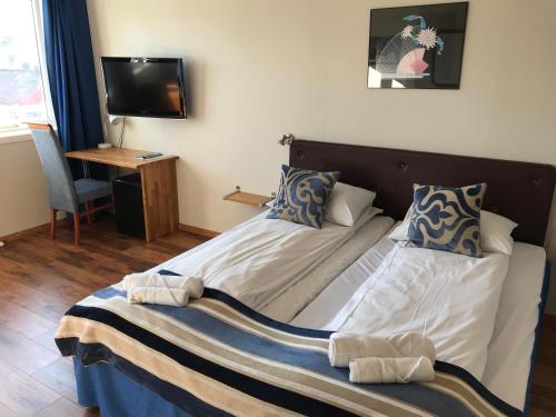 Imagen de la habitación del Hotel Vestnes Fjordhotell. Foto 3