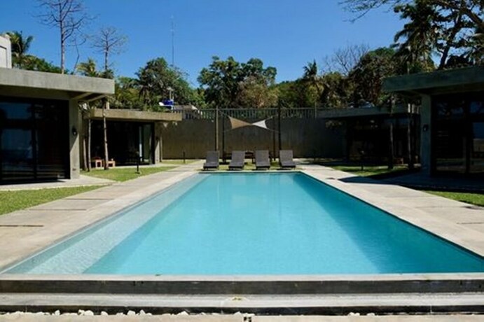 Imagen de la piscina del Hotel Veue Beach Cabins. Foto 23