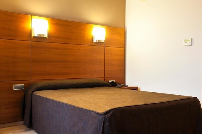 Imagen de la habitación del Hotel Via Augusta. Foto 11