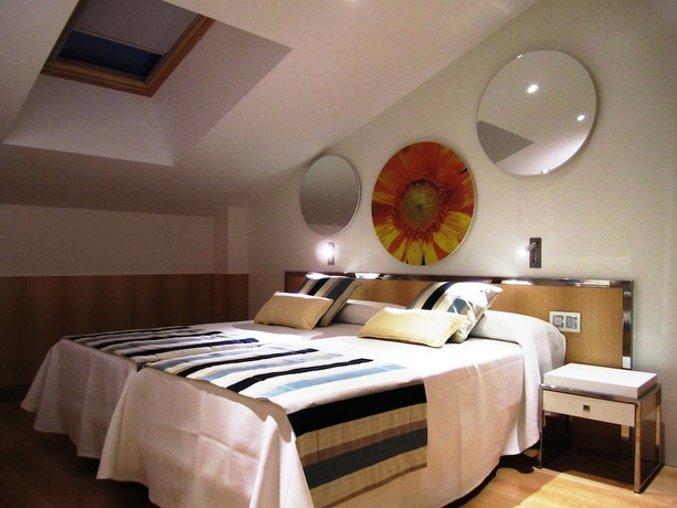 Imagen de la habitación del Hotel Via Gotica. Foto 10