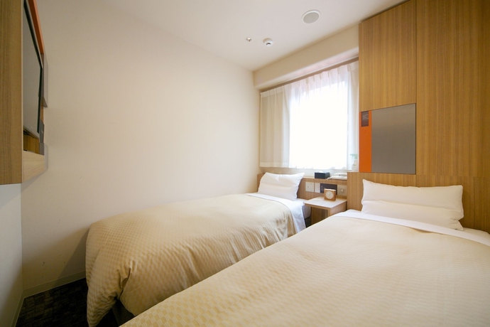 Imagen de la habitación del Hotel Via Inn Hiroshima. Foto 8