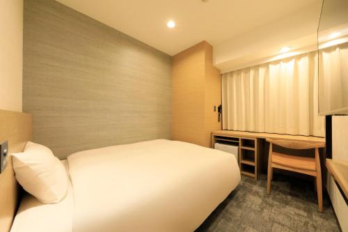 Imagen de la habitación del Hotel Via Inn Prime Akasaka. Foto 15