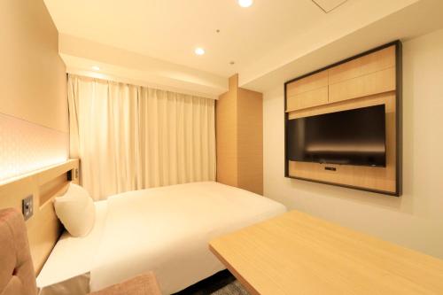 Imagen de la habitación del Hotel Via Inn Prime Akasaka. Foto 18