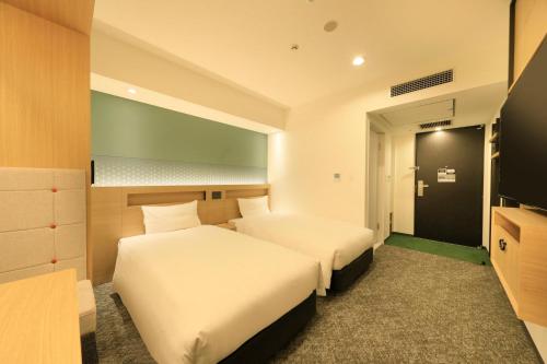 Imagen de la habitación del Hotel Via Inn Prime Akasaka. Foto 19