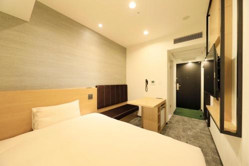 Imagen de la habitación del Hotel Via Inn Prime Akasaka. Foto 20