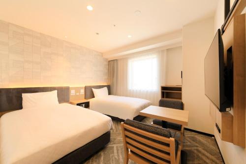 Imagen de la habitación del Hotel Via Inn Prime Sapporo Odori. Foto 15