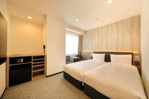 Imagen de la habitación del Hotel Via Inn Prime Sapporo Odori. Foto 16