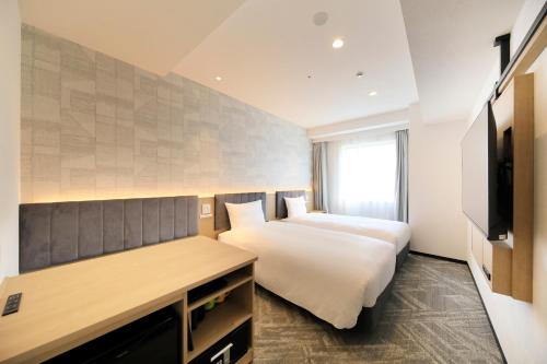 Imagen de la habitación del Hotel Via Inn Prime Sapporo Odori. Foto 18