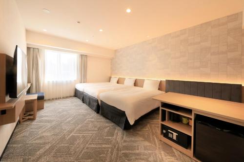 Imagen de la habitación del Hotel Via Inn Prime Sapporo Odori. Foto 19