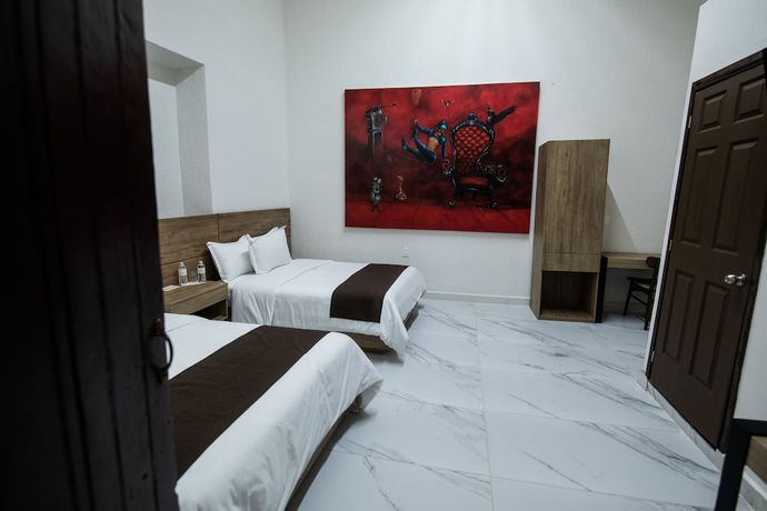 Imagen de la habitación del Hotel Via Real. Foto 10