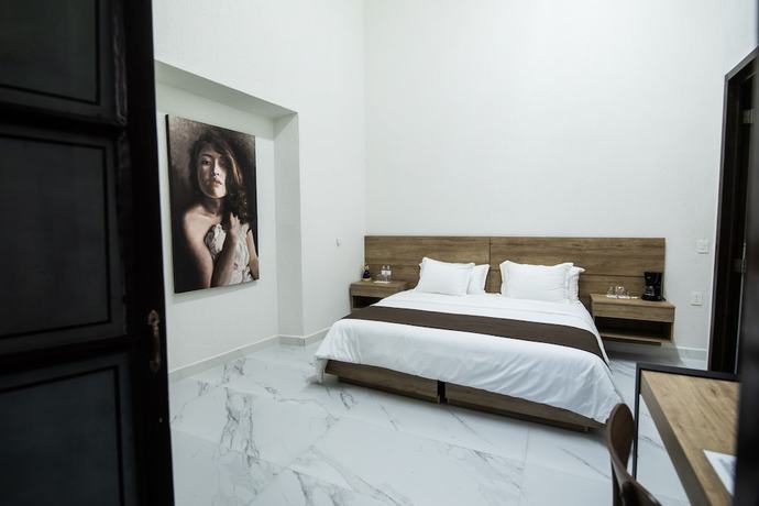 Imagen de la habitación del Hotel Via Real. Foto 12