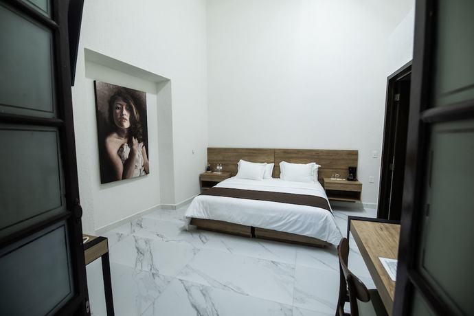 Imagen de la habitación del Hotel Via Real. Foto 15