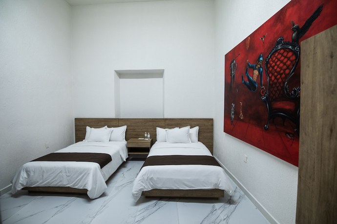 Imagen de la habitación del Hotel Via Real. Foto 16