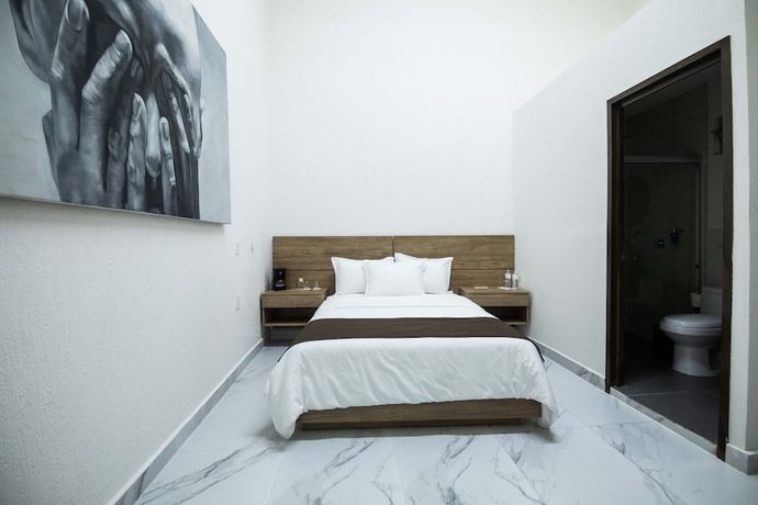 Imagen de la habitación del Hotel Via Real. Foto 17