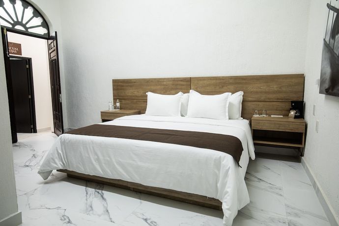 Imagen de la habitación del Hotel Via Real. Foto 19