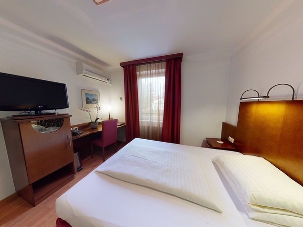 Imagen de la habitación del Hotel Via Roma. Foto 14