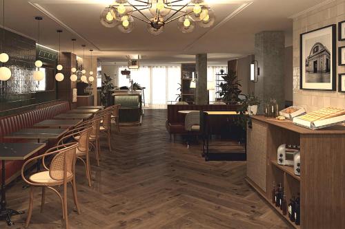 Imagen del bar/restaurante del Hotel Via Sants Barcelona, Tapestry Collection By Hilton. Foto 2