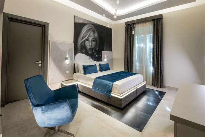 Imagen de la habitación del Hotel Via Veneto Luxury Suites. Foto 2