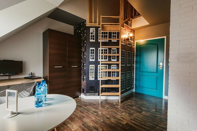 Imagen de la habitación del Hotel Via Villa. Foto 12
