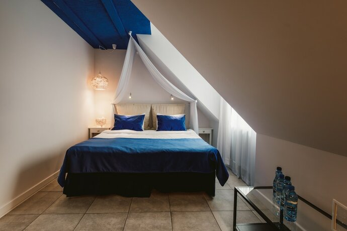Imagen de la habitación del Hotel Via Villa. Foto 14