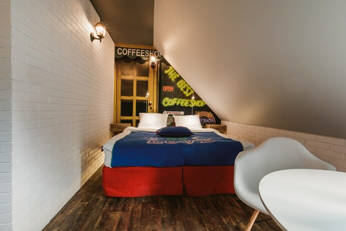 Imagen de la habitación del Hotel Via Villa. Foto 19