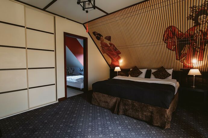Imagen de la habitación del Hotel Via Villa. Foto 20