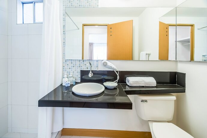 Imagen de la habitación del Hotel Viaggio Studios. Foto 8